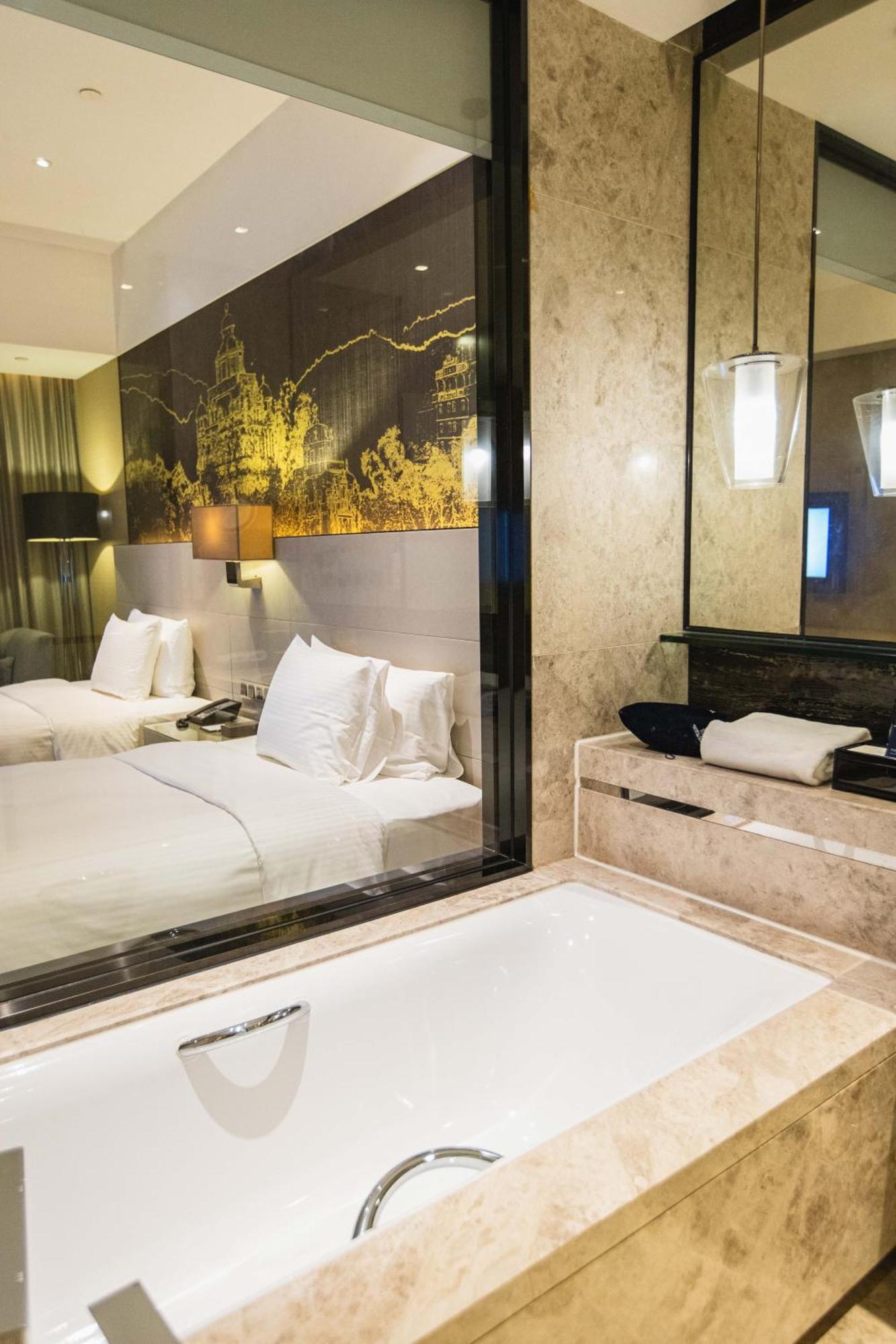 Wanda Realm Jiangmen Hotell Exteriör bild