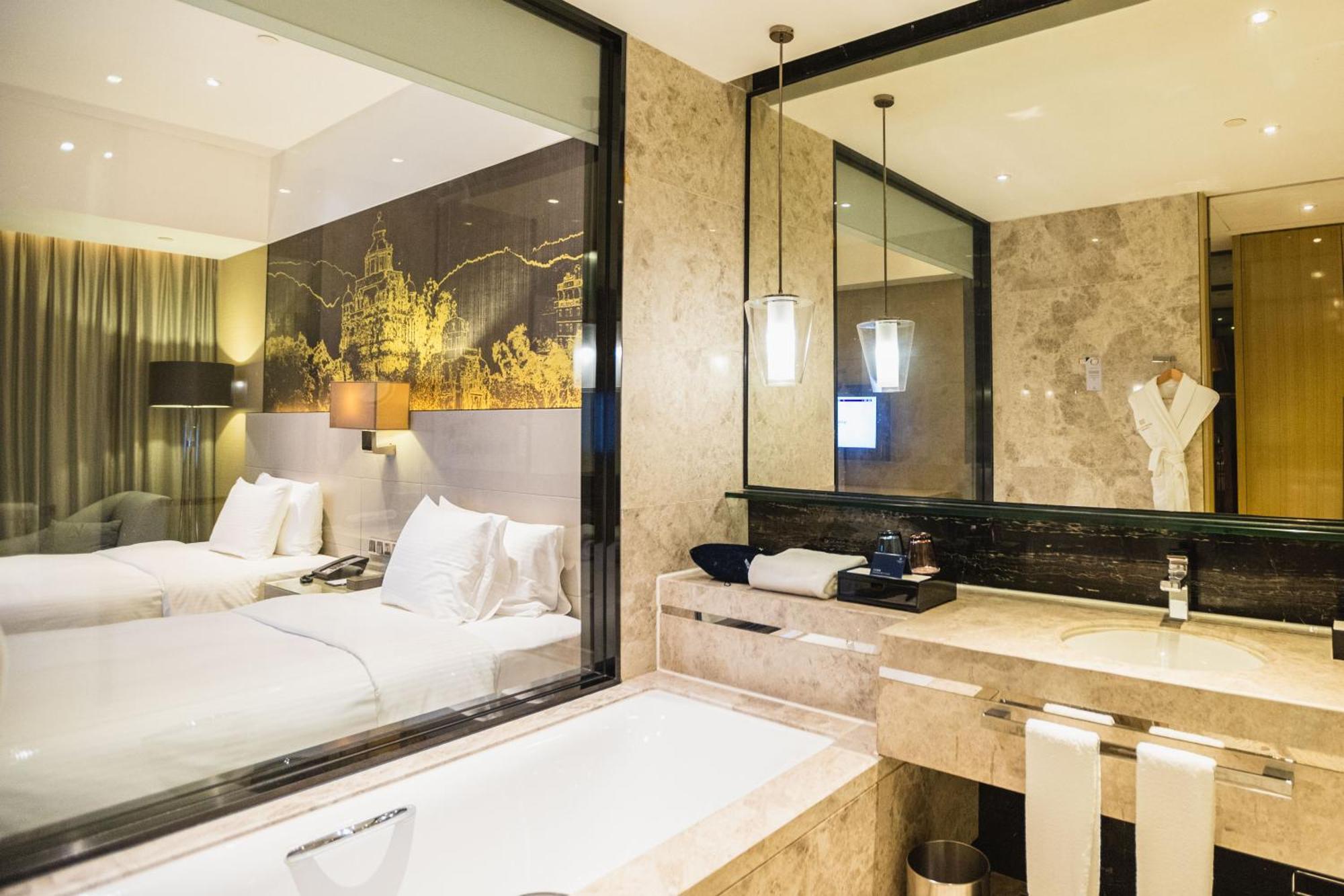 Wanda Realm Jiangmen Hotell Exteriör bild