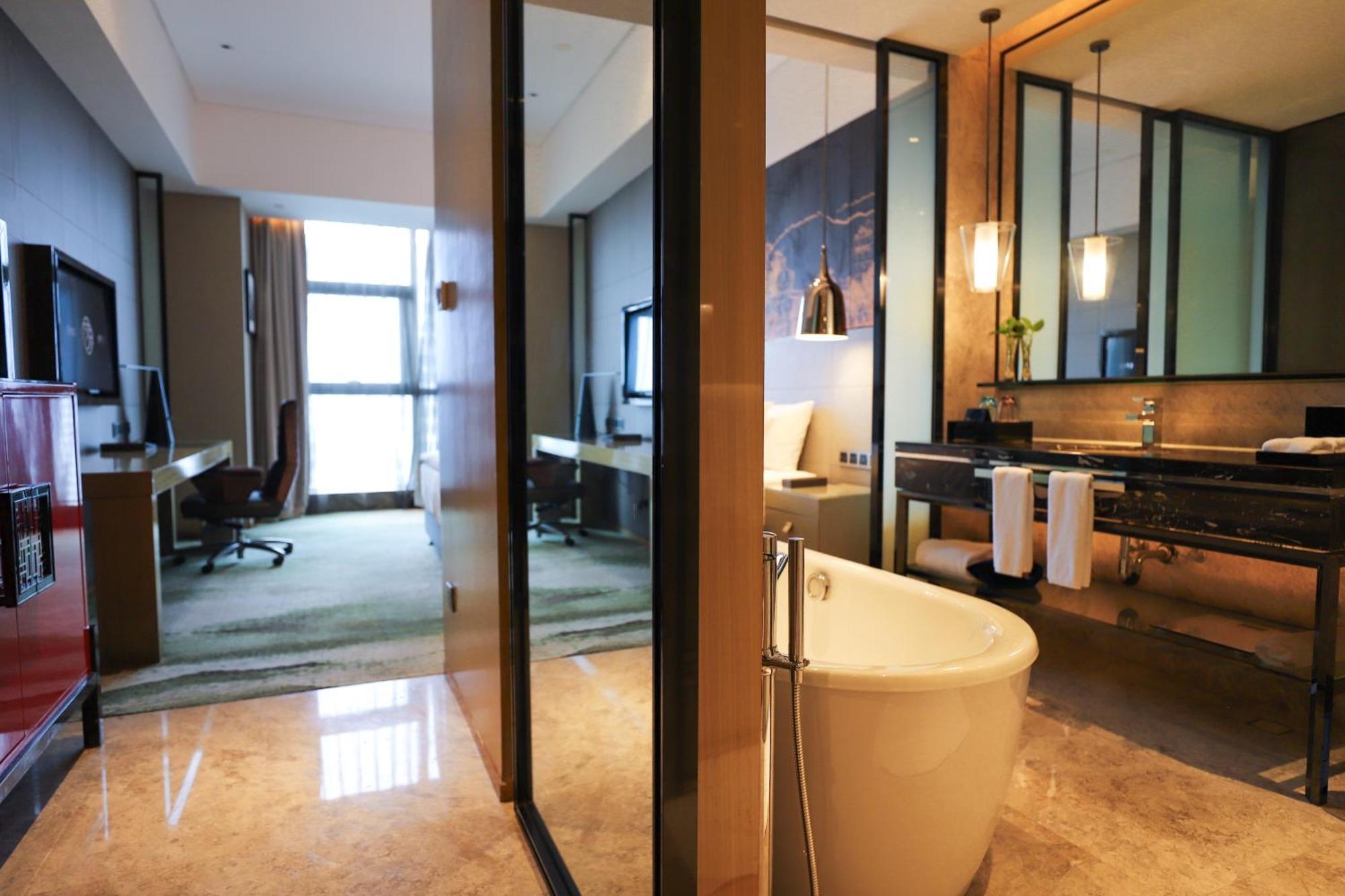 Wanda Realm Jiangmen Hotell Exteriör bild
